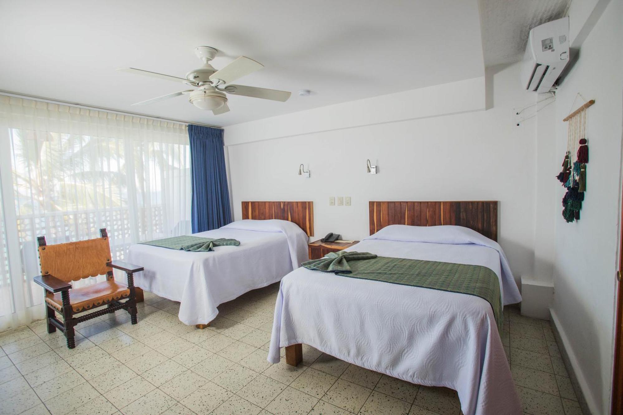 Double Room Two Double Beds Ocean View,1769551326:JPEG